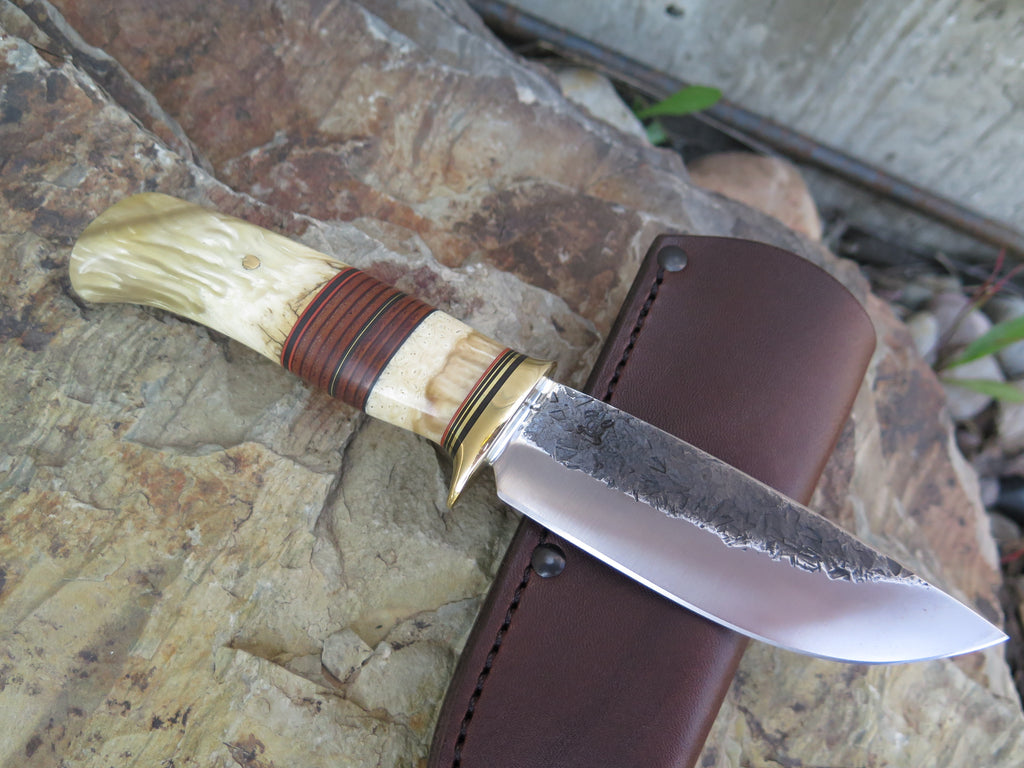 Premium Musk Ox Boss and Horsehide Drop Point