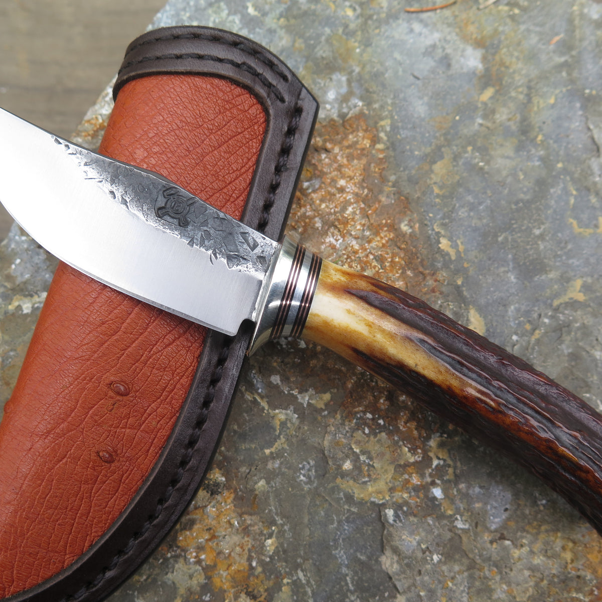 Antique Sambar Stag Clip Point Pocket + Ostrich inlay – Behring Made