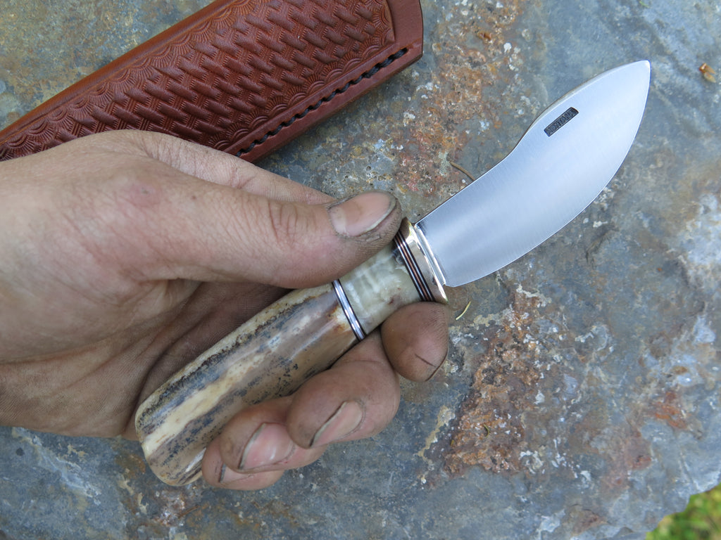 Fossil Walrus and Musk Ox Boss Canoe Knife